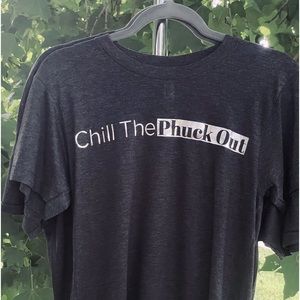 Here’s a “Chill The Phuck Out” T-Shirt in a dark gray color and Foil Lettering.